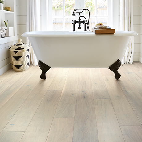 Bathroom with clawed bathtub