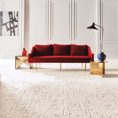 Red Couch on Nylon Carpet